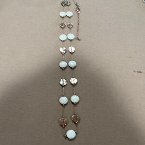 Gold and White Necklace with Elegant Design